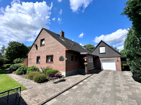 Einfamilienhaus mit Einliegerwohnung und Vollkeller in ruhiger Lage, 23717 Griebel, Einfamilienhaus