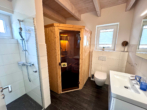 Duschbad mit Sauna - Ein traumhaftes Ferienhaus in Strandlage